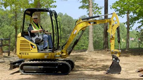 mini digger on its side|mini excavator tips and tricks.